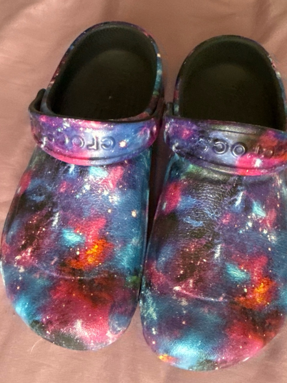 CROCS women’s  Galaxy Print Clogs in Blue, Purple, Pink and Orange